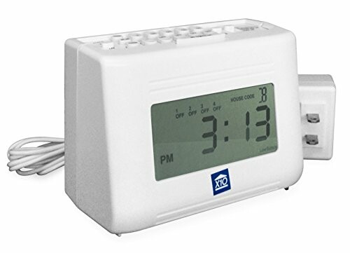 White digital timer switch with display showing 3:13 PM