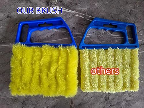 Comparison of two yellow car wash brushes with blue handles on a gray surface.